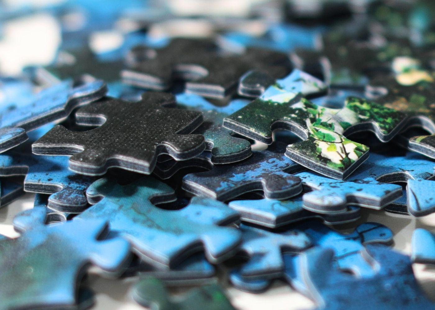 Colorful puzzle pieces close up view