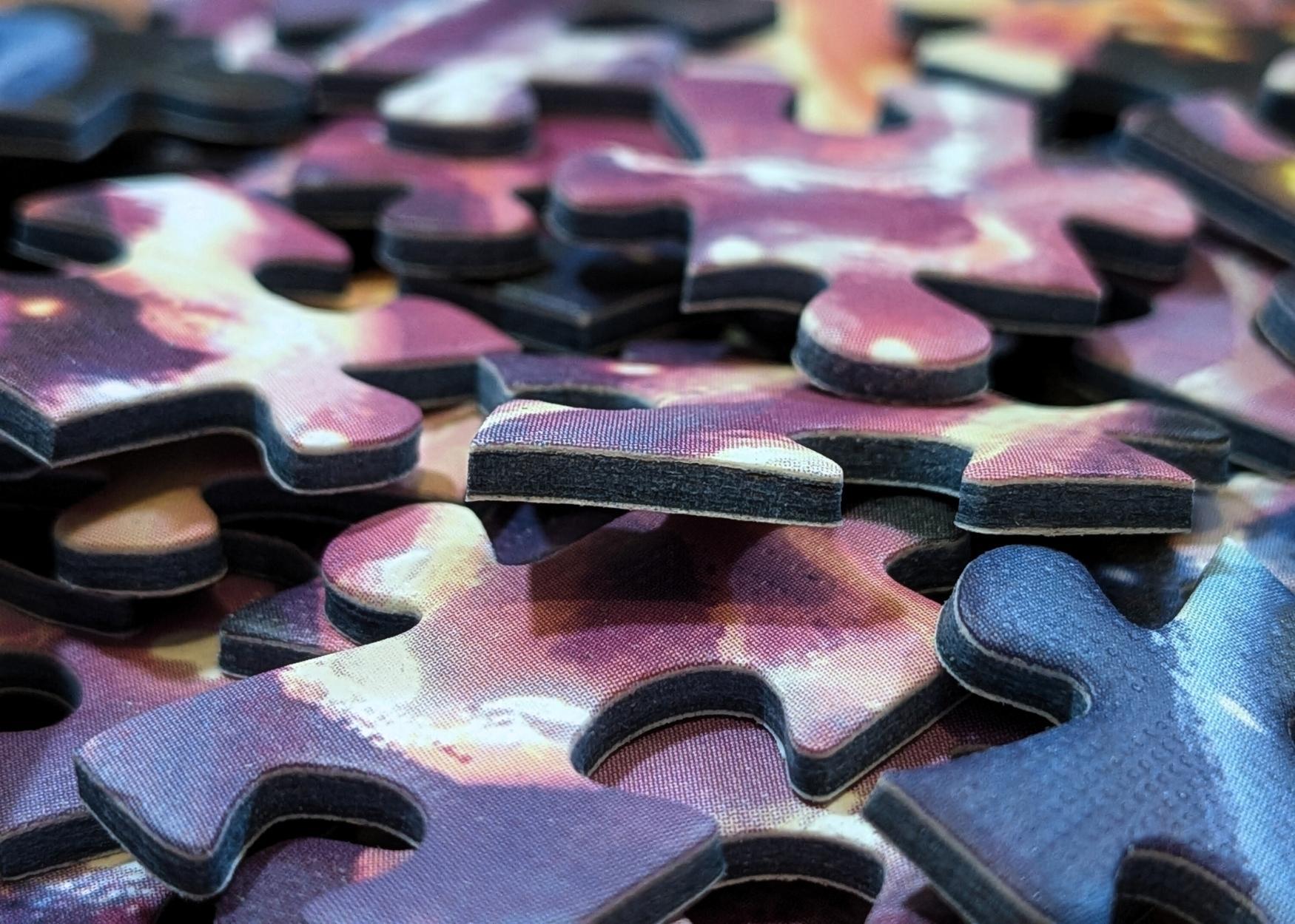 Scrambled puzzle pieces side view
